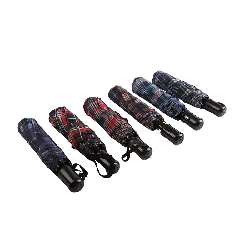 مخطط شبكي يتقلص مظلة قماشية بثلاث طيات - 0E6B0432